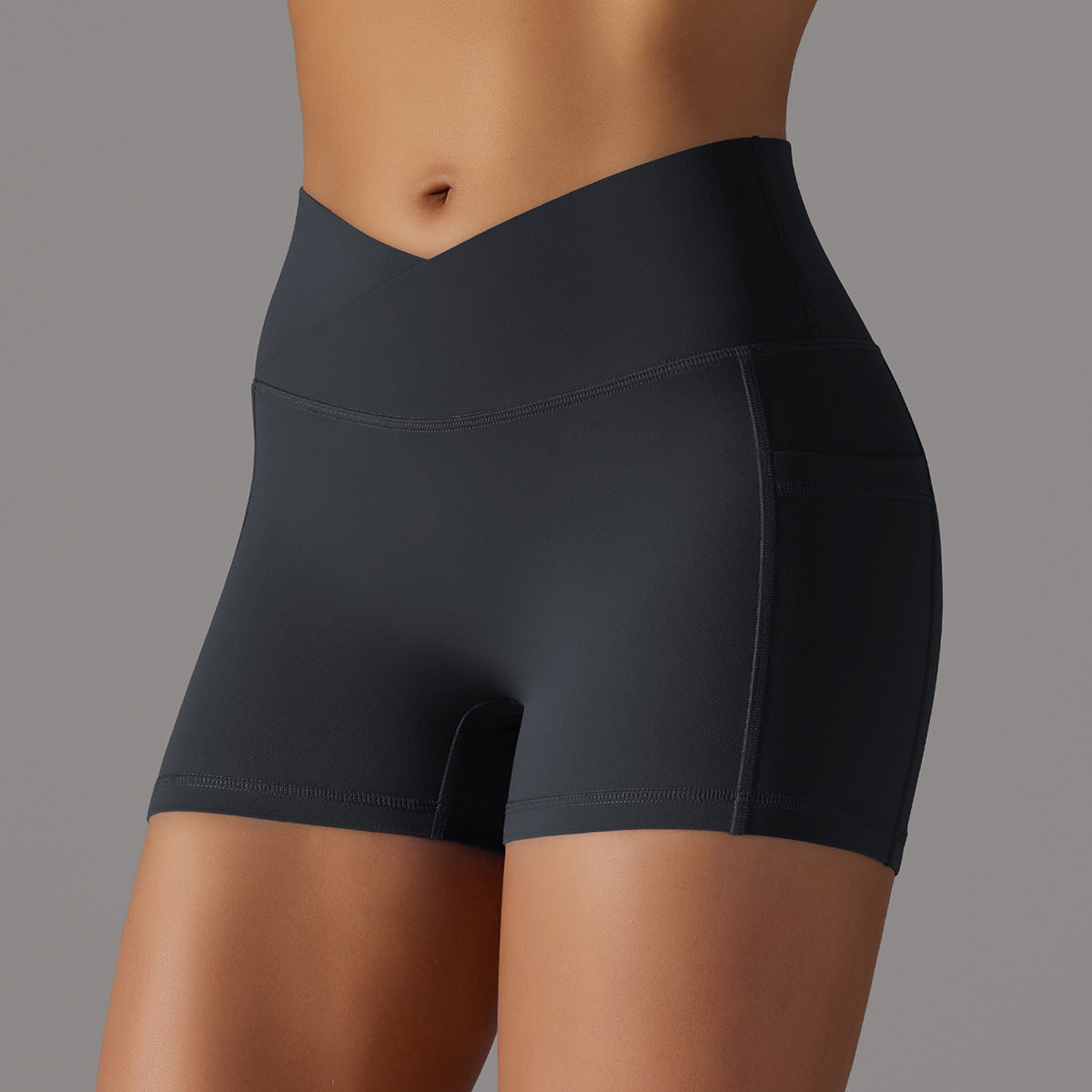 Shorts de yoga avec conception de poche de téléphone pantalons de sport pour femmes