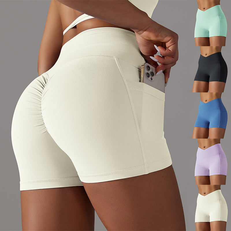 Shorts de yoga avec conception de poche de téléphone pantalons de sport pour femmes