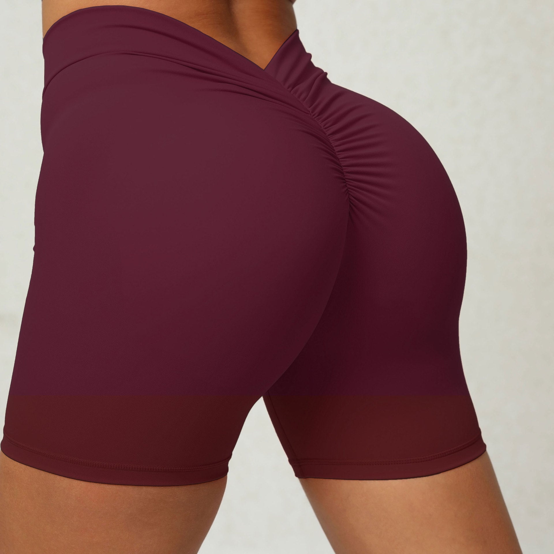 Shorts de yoga moulants en forme de V à la taille arrière